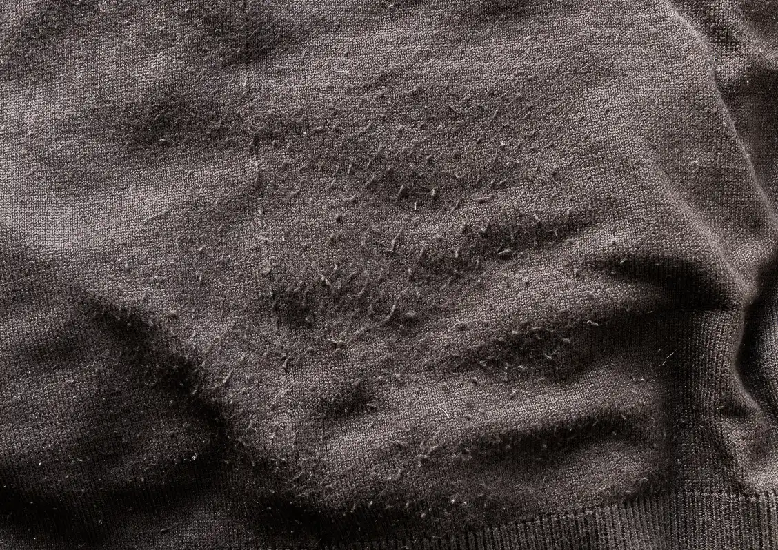 Faserknötchen am Pullover